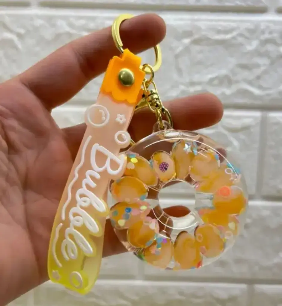 Cute Water Filled Floating Donut Keychain (Multicolor)